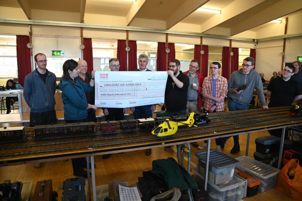 Yorkshire members presenting Yorkshire Air Ambulance with our donation of £1.500
