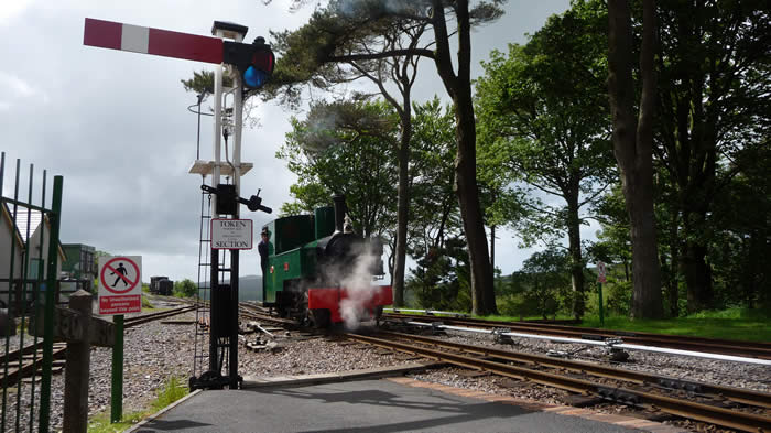 Axe waiting to pick up her train